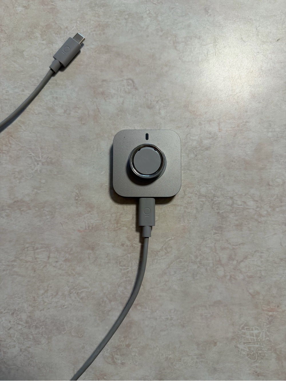 Oura Charging Dock in Light Gray and Silver